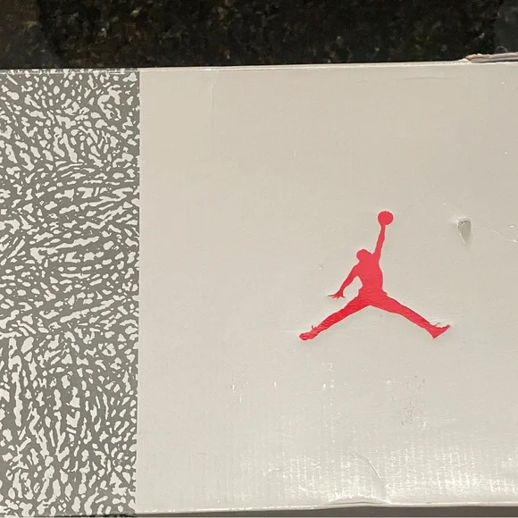 Jordan Gray and Orange Athletic Shoes with Classic Design